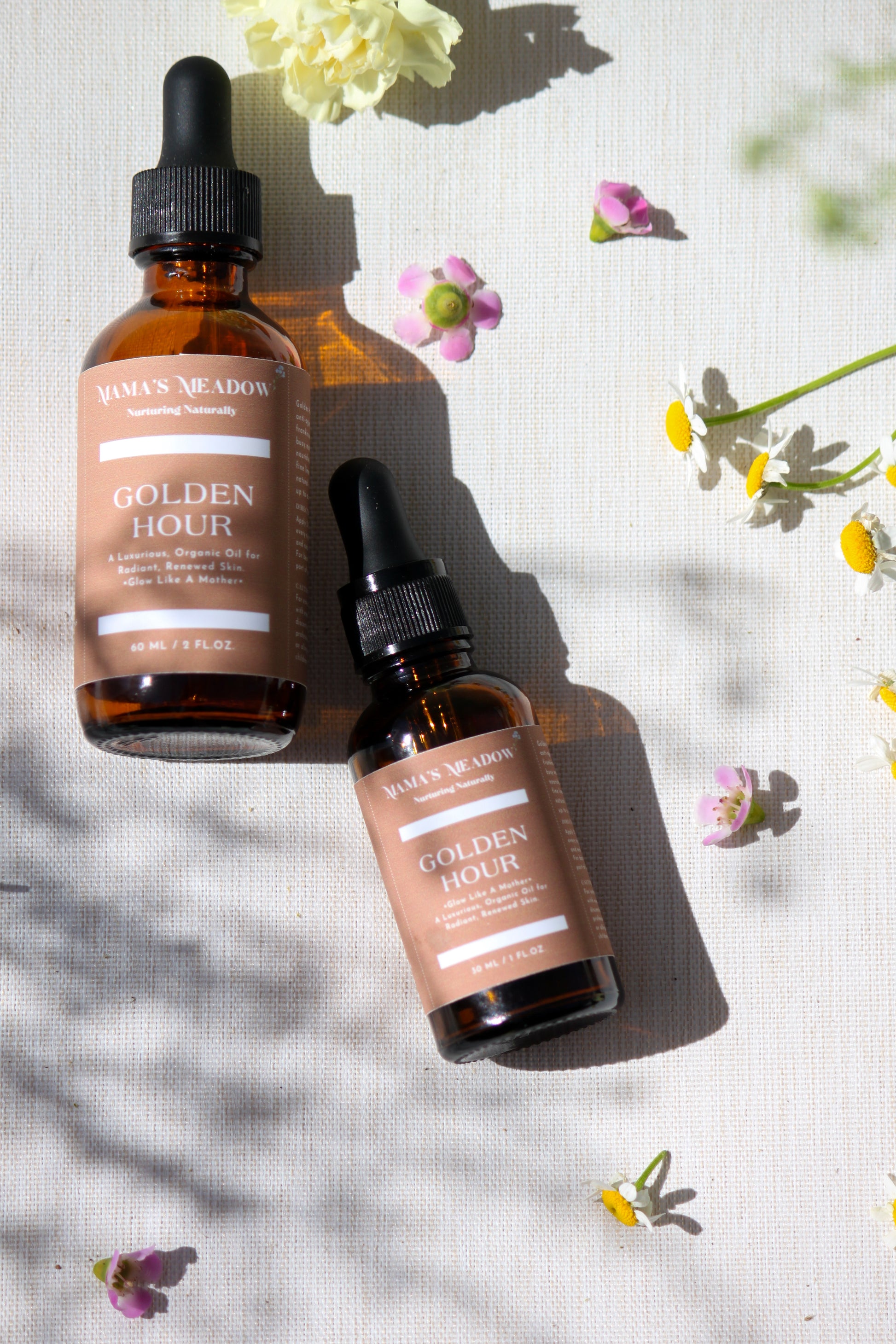 A luxurious evening facial oil in a glass dropper bottle, made with black seed oil, rosehip oil, and frankincense essential oil to nourish, restore radiance, and reduce fine lines for busy mothers.