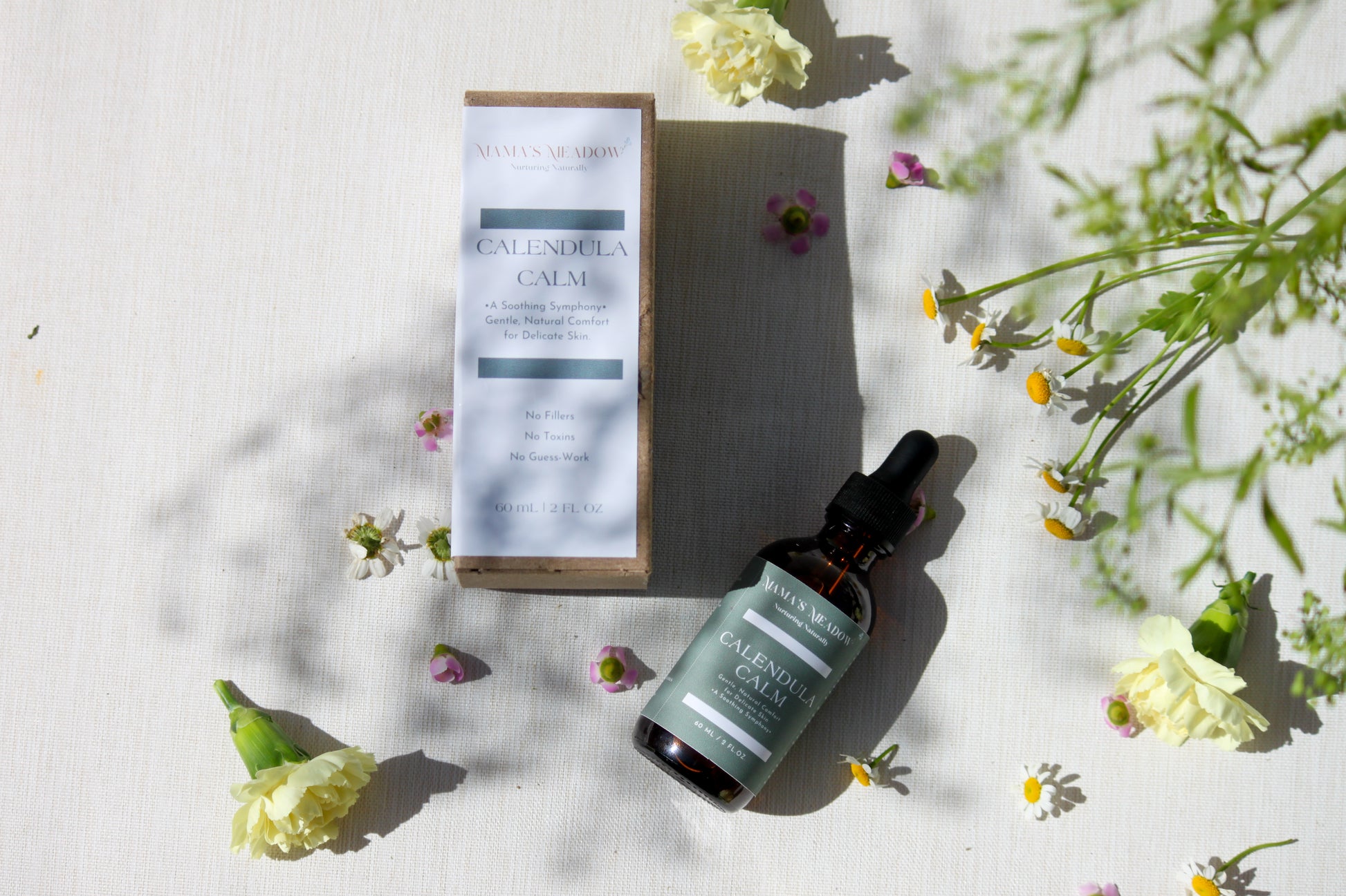 A gentle, all-purpose skin oil in a glass bottle, infused with coconut oil, jojoba oil, and calendula oil to hydrate and soothe sensitive skin, perfect for the whole family.