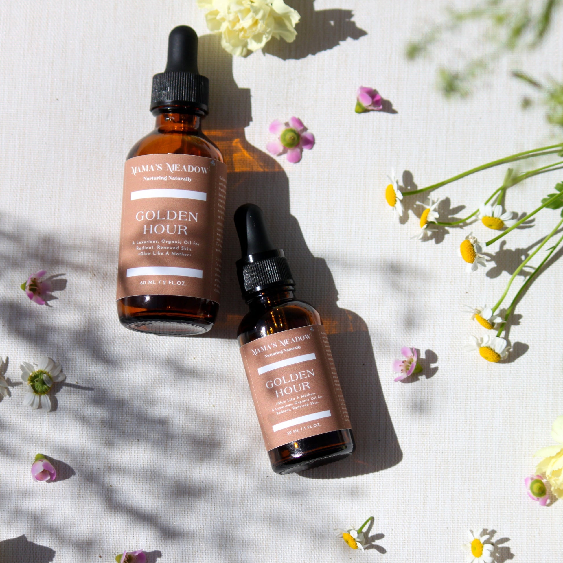 A luxurious evening facial oil in a glass dropper bottle, made with black seed oil, rosehip oil, and frankincense essential oil to nourish, restore radiance, and reduce fine lines for busy mothers.