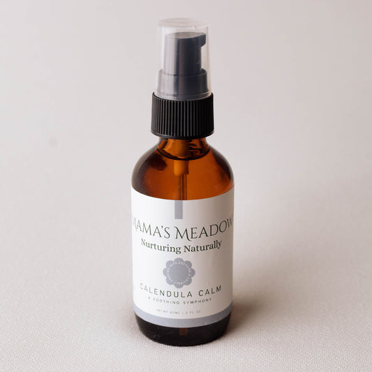 Amber glass bottle with a label on a light gray background