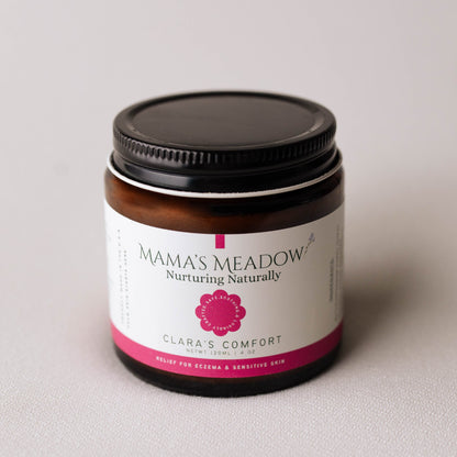 Jar of 'Mama's Meadow' product on a light gray background
