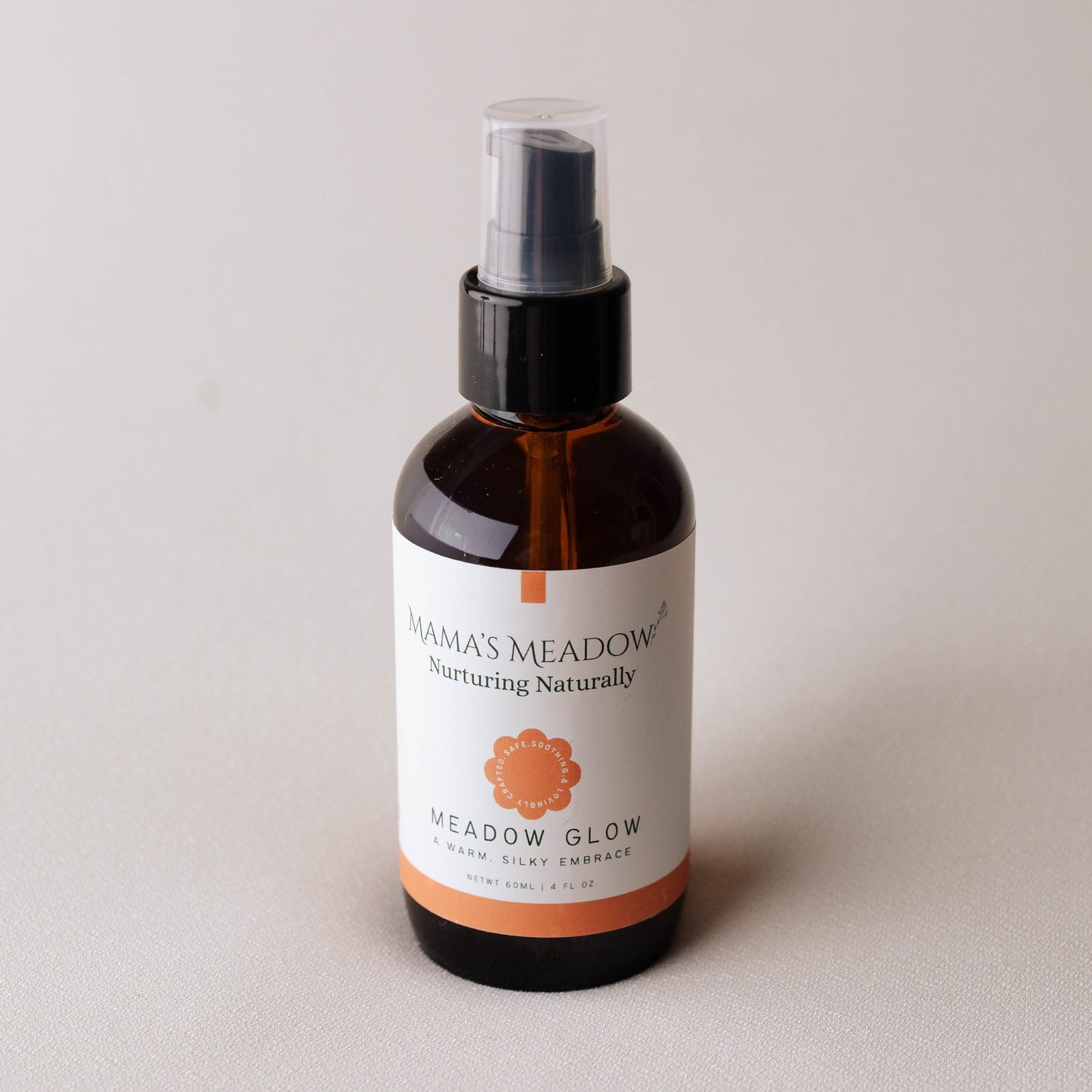 Bottle of 'Mama's Meadow' Meadow Glow on a light background